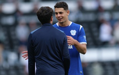 220826 - Derby County v Cardiff City, EFL Sky Bet Championship - Cardiff City head coach Brian Barry-Murphy with Yousef Salech of Cardiff City at the end of the match