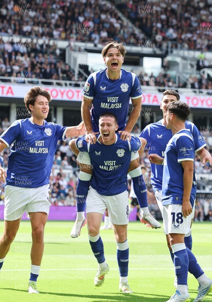 220826 - Derby County v Cardiff City, EFL Sky Bet Championship - Cian Ashford of Cardiff City celebrates on the shoulders of Jack Moylan of Cardiff City after scoring the first goal