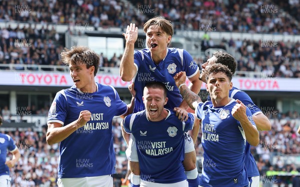 220826 - Derby County v Cardiff City, EFL Sky Bet Championship - Cian Ashford of Cardiff City celebrates on the shoulders of Jack Moylan of Cardiff City after scoring the first goal