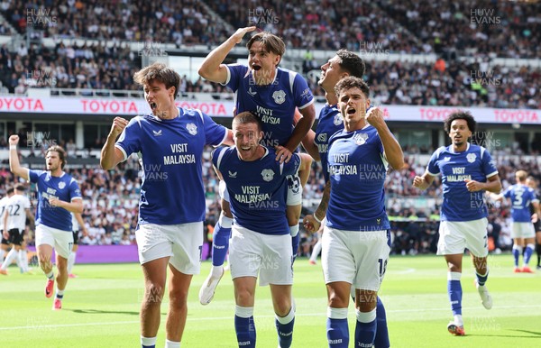 220826 - Derby County v Cardiff City, EFL Sky Bet Championship - Cian Ashford of Cardiff City celebrates on the shoulders of Jack Moylan of Cardiff City after scoring the first goal