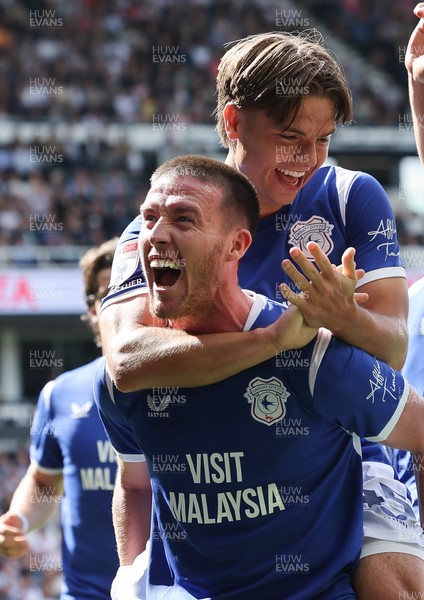 220826 - Derby County v Cardiff City, EFL Sky Bet Championship - Cian Ashford of Cardiff City celebrates on the shoulders of Jack Moylan of Cardiff City after scoring the first goal