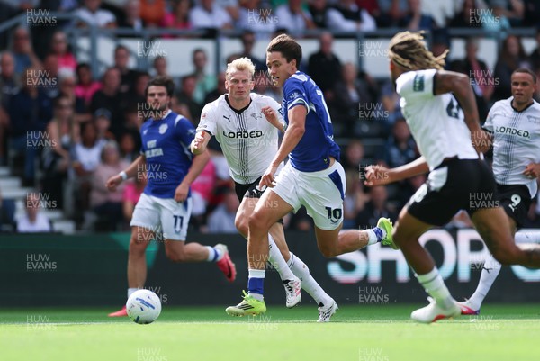 220826 - Derby County v Cardiff City, EFL Sky Bet Championship - Rubin Colwill of Cardiff City races through to set up goal for Yousef Salech of Cardiff City