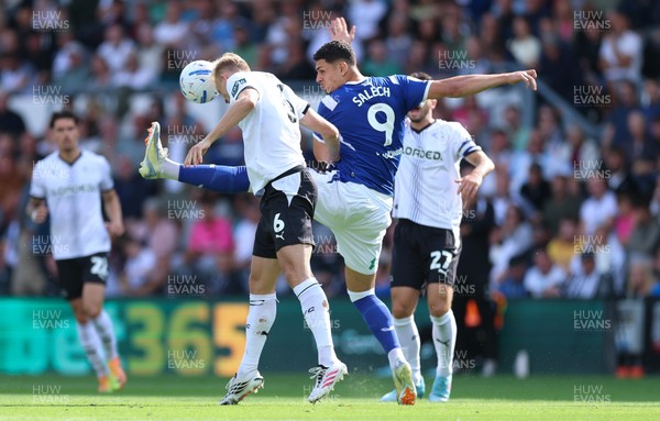 220826 - Derby County v Cardiff City, EFL Sky Bet Championship - Yousef Salech of Cardiff City and Sondre Langas of Derby County compete for the ball