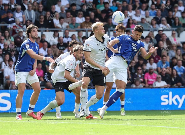 220826 - Derby County v Cardiff City, EFL Sky Bet Championship - Yousef Salech of Cardiff City looks to head at goal