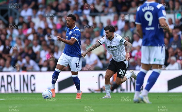 220826 - Derby County v Cardiff City, EFL Sky Bet Championship - Chris Willock of Cardiff City takes on Alex Mowatt of Derby County