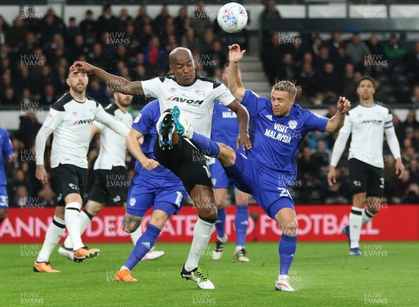 240418 - Derby County v Cardiff City, Sky Bet Championship - \d14\ and Jamie Ward of Cardiff City compete for the ball