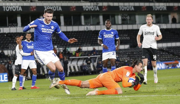 281020 - Derby County v Cardiff City - Sky Bet Championship - Kelle Roos of Derby saves at the feet of Kieffer Moore of Cardiff