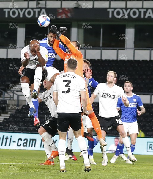 281020 - Derby County v Cardiff City - Sky Bet Championship - Robert Glatzel of Cardiff has his header punched clear by Kelle Roos of Derby
