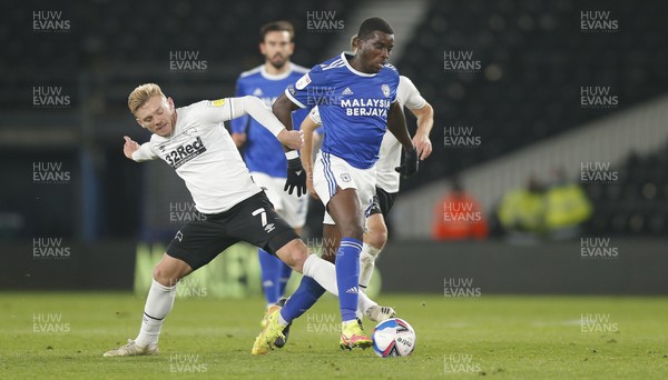 281020 - Derby County v Cardiff City - Sky Bet Championship - Sheyi Ojo of Cardiff is tackled by Kamil Jozwiak of Derby