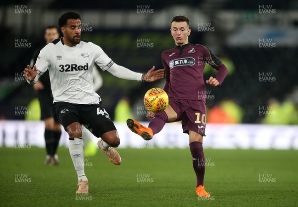 011218 - Derby County v Swansea City - SkyBet Championship - Bersant Celina of Swansea City is challenged by Tom Huddlestone of Derby