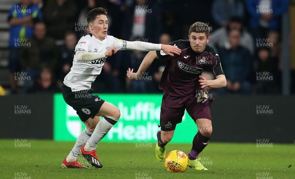 011218 - Derby County v Swansea City - SkyBet Championship - Declan John of Swansea City is challenged by Harry Wilson of Derby