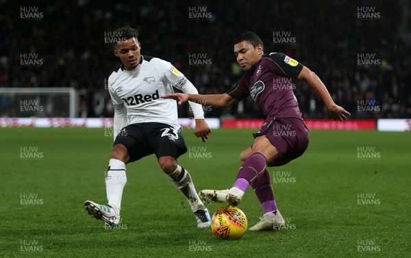 011218 - Derby County v Swansea City - SkyBet Championship - Jefferson Montero of Swansea City is challenged by Duane Holmes of Derby