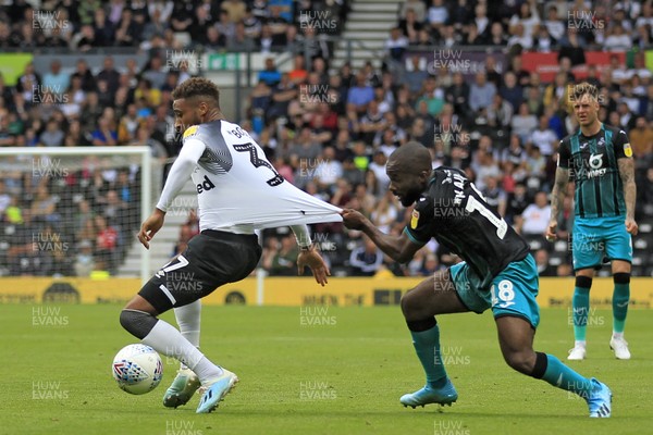 100819 - Derby County v Swansea City, Sky Bet Championship - Aldo Kalulu of Swansea City (right) in action with Jayden Bogle of Derby County