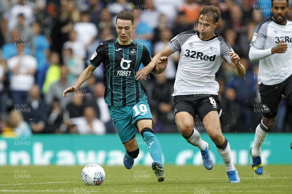 100819 - Derby County v Swansea City, Sky Bet Championship - Bersant Celina of Swansea City (left) in action with Kieran Dowell of Derby County