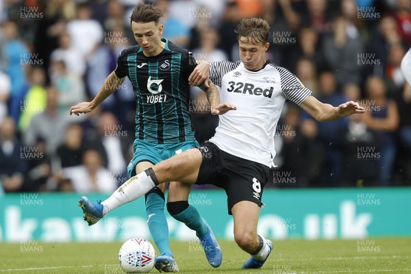 100819 - Derby County v Swansea City, Sky Bet Championship - Bersant Celina of Swansea City (left) in action with Kieran Dowell of Derby County