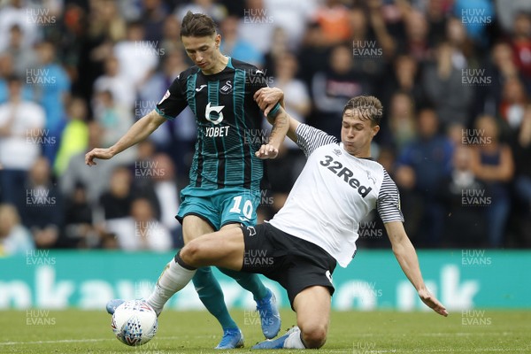 100819 - Derby County v Swansea City, Sky Bet Championship - Bersant Celina of Swansea City (left) and Kieran Dowell of Derby County battle for the ball