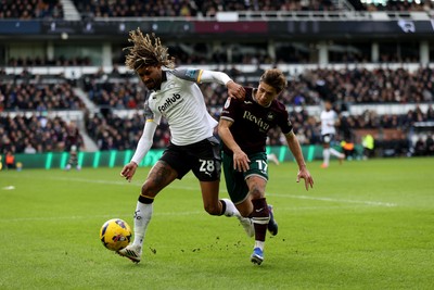 140226 - Derby County v Swansea City - Sky Bet Championship - David Ozoh of Derby County and Goncalo Franco of Swansea City