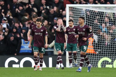 140226 - Derby County v Swansea City - Sky Bet Championship - Josh Tymon of Swansea City dejected with team mates after Derby County score their second goal 