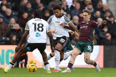 140226 - Derby County v Swansea City - Sky Bet Championship - Liam Cullen of Swansea and Rhian Brewster of Derby and David Ozoh of Derby