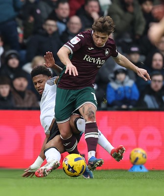 140226 - Derby County v Swansea City - Sky Bet Championship - Goncalo Franco of Swansea and Patrick Agyemang of Derby