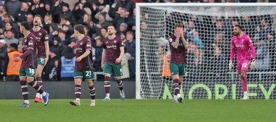 140226 - Derby County v Swansea City - Sky Bet Championship - Dejection from Cameron Burgess of Swansea and Josh Tymon of Swansea after 2nd goal is scored by Derby