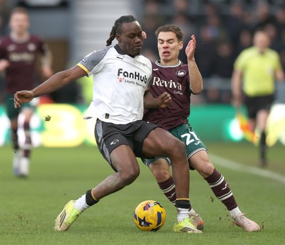 140226 - Derby County v Swansea City - Sky Bet Championship - Manuel Benson of Swansea and David Ozoh of Derby clash in the 2nd half