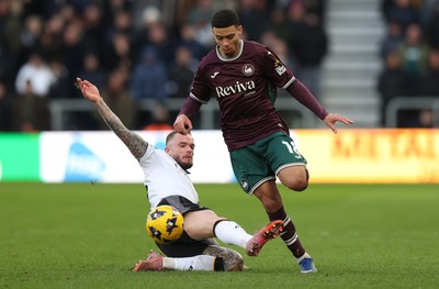 140226 - Derby County v Swansea City - Sky Bet Championship - Gustavo Nunes of Swansea and Joe Ward of Derby