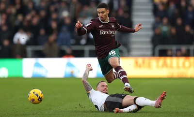 140226 - Derby County v Swansea City - Sky Bet Championship - Gustavo Nunes of Swansea and Joe Ward of Derby