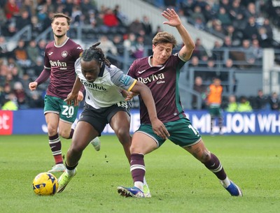 140226 - Derby County v Swansea City - Sky Bet Championship - Goncalo Franco of Swansea and David Ozoh of Derby