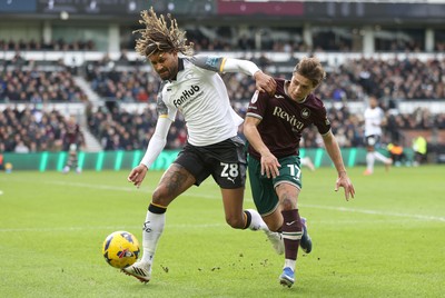 140226 - Derby County v Swansea City - Sky Bet Championship - Goncalo Franco of Swansea and Dion Sanderson of Derby