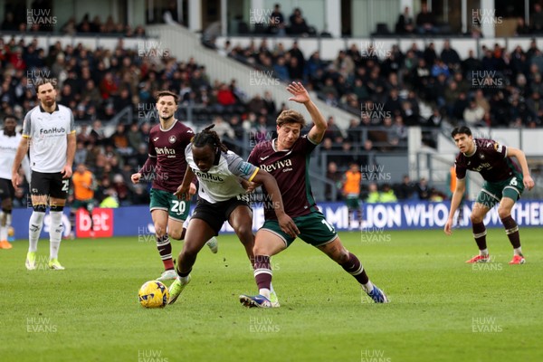 140226 - Derby County v Swansea City - Sky Bet Championship - David Ozoh of Derby County and Goncalo Franco of Swansea City