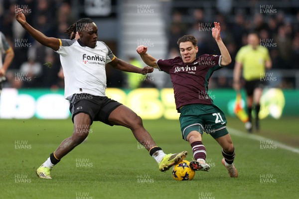 140226 - Derby County v Swansea City - Sky Bet Championship - David Ozoh of Derby County and Leo Walta of Swansea City