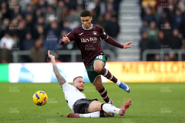 140226 - Derby County v Swansea City - Sky Bet Championship - Joe Ward of Derby County and Gustavo Nunes of Swansea City