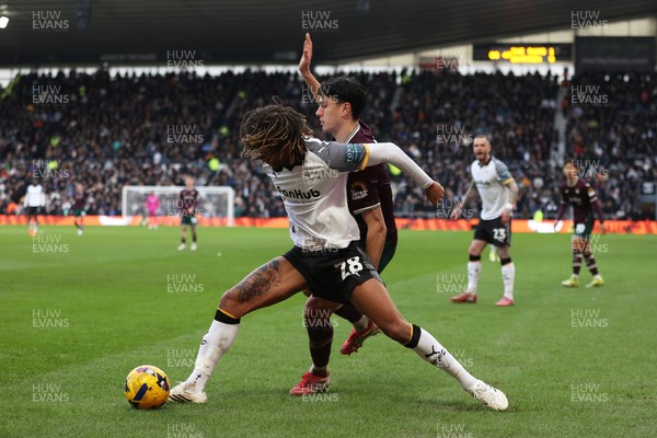 140226 - Derby County v Swansea City - Sky Bet Championship - Dion Sanderson of Derby County and Marko Stamenic of Swansea City