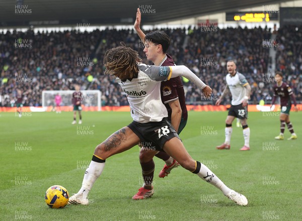 140226 - Derby County v Swansea City - Sky Bet Championship - Marko Stamenic of Swansea and Dion Sanderson of Derby