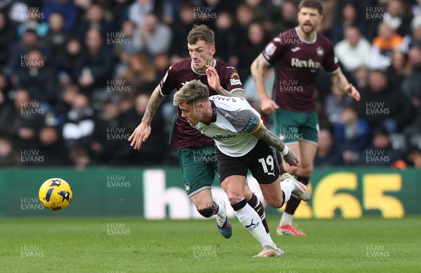 140226 - Derby County v Swansea City - Sky Bet Championship - Josh Tymon of Swansea and Sammie Szmodics of Derby