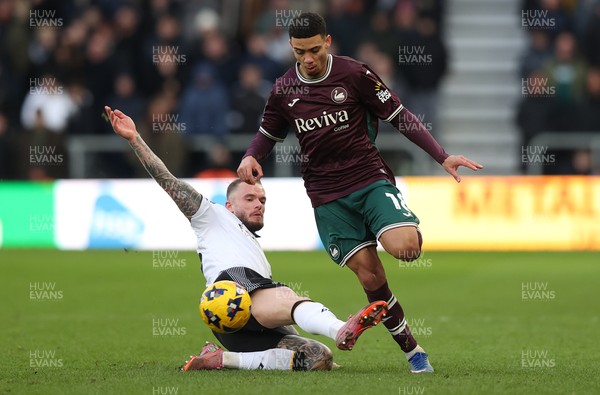 140226 - Derby County v Swansea City - Sky Bet Championship - Gustavo Nunes of Swansea and Joe Ward of Derby