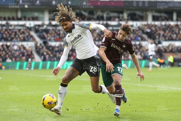 140226 - Derby County v Swansea City - Sky Bet Championship - Goncalo Franco of Swansea and Dion Sanderson of Derby