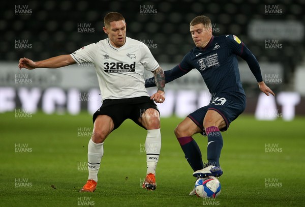 161220 - Derby County v Swansea City - SkyBet Championship - Jake Bidwell of Swansea City is challenged by Martyn Waghorn of Derby County