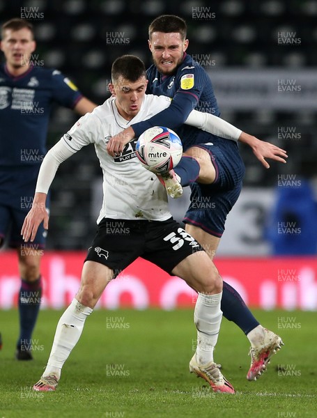 161220 - Derby County v Swansea City - SkyBet Championship - Jason Knight of Derby County is tackled by Matt Grimes of Swansea City