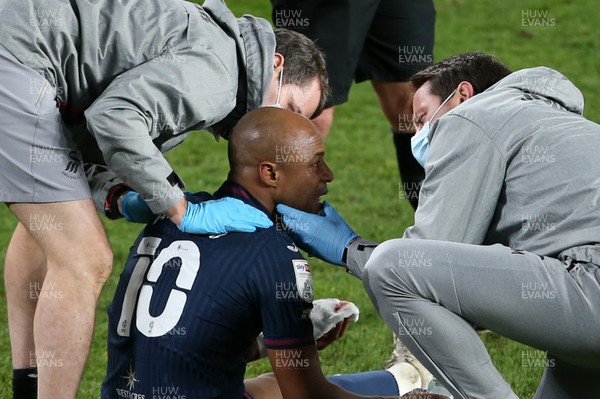161220 - Derby County v Swansea City - SkyBet Championship - Andre Ayew of Swansea City is seen to by medical staff