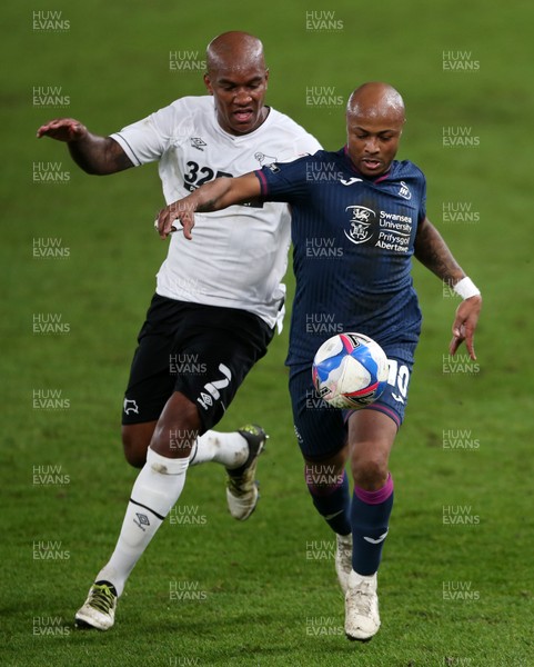 161220 - Derby County v Swansea City - SkyBet Championship - Andre Ayew of Swansea City is challenged by Andre Wisdom of Derby County