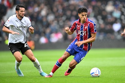 290826 - Derby County v Swansea City - Sky Bet Championship - Marko Stamenic of Swansea City is challenged by Lewis Travis of Derby