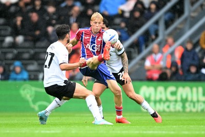 290826 - Derby County v Swansea City - Sky Bet Championship - Melker Widell of Swansea City is challenged by Lewis Travis of Derby