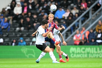 290826 - Derby County v Swansea City - Sky Bet Championship - Melker Widell of Swansea City is challenged by Lewis Travis of Derby