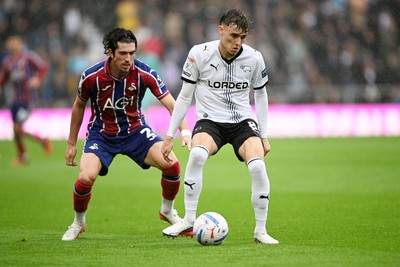 290826 - Derby County v Swansea City - Sky Bet Championship - Josh Key of Swansea City is challenged by Bobby Clark of Derby