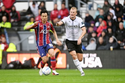 290826 - Derby County v Swansea City - Sky Bet Championship - Eom Ji-Sung of Swansea City is challenged by Sondre Langas of Derby