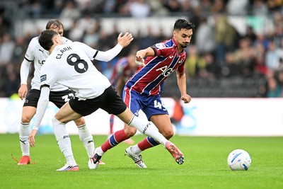 290826 - Derby County v Swansea City - Sky Bet Championship - Stephen Estaquio of Swansea City is challenged by Bobby Clark of Derby
