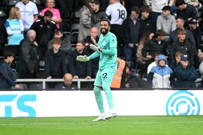 290826 - Derby County v Swansea City - Sky Bet Championship - Lawrence Vigouroux of Swansea City celebrates at full time