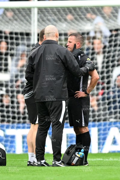 290826 - Derby County v Swansea City - Sky Bet Championship - Referee, David Webb is struck in the face by the ball